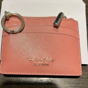 kate spade New York card case, rose colored
